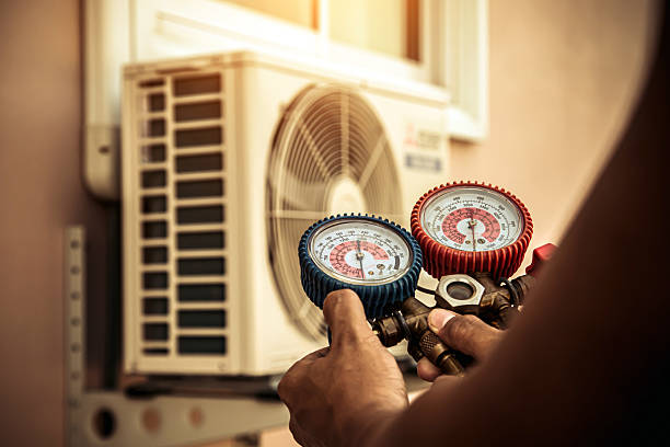 Professional Hvac technician working in Jessup, MD